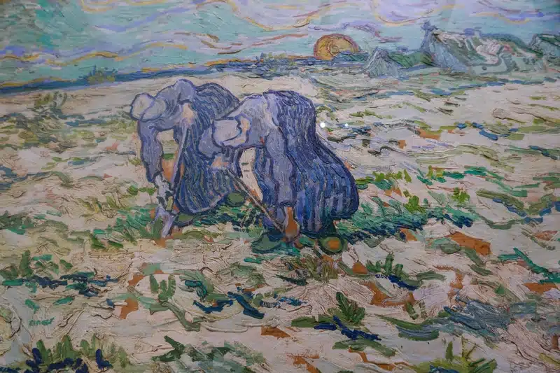Descendant in astrology illustrated by two women working closely together in a textured field beneath a swirling pastel sky.