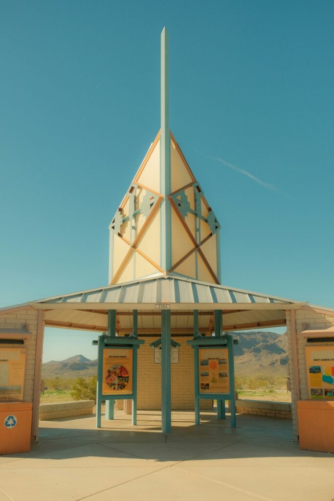 Pisces Season 2026 symbolic image of a geometric pavilion under a clear blue sky, evoking stillness, perspective and quiet transition.