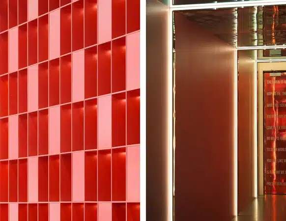 Mercury in aries energy reflected in bold red geometric wall.
