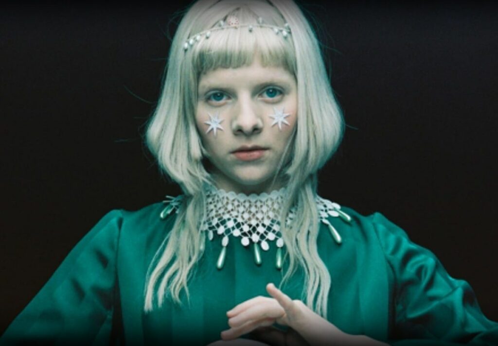 taurus rising AURORA portrait, symbolizing soft sensuality, grounded presence, and the quiet expression of the famous singer.