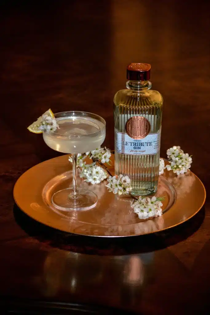 taurus rising elegance represented by a  table with whiskey glasses in warm earthy tones, symbolizing sensuality, pleasure, and refined appreciation of the senses
