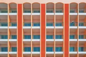 venus in cancer symbolism, pattern of windows on a building facade representing emotional layers, protection, and the idea of home