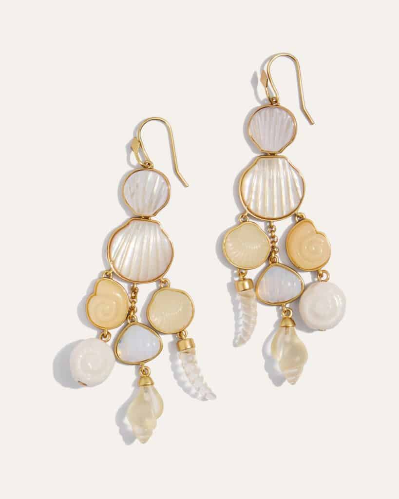 gold dangling shell earrings for Cancer Season, symbolizing water, memory, softness, and the emotional world of the zodiac sign
