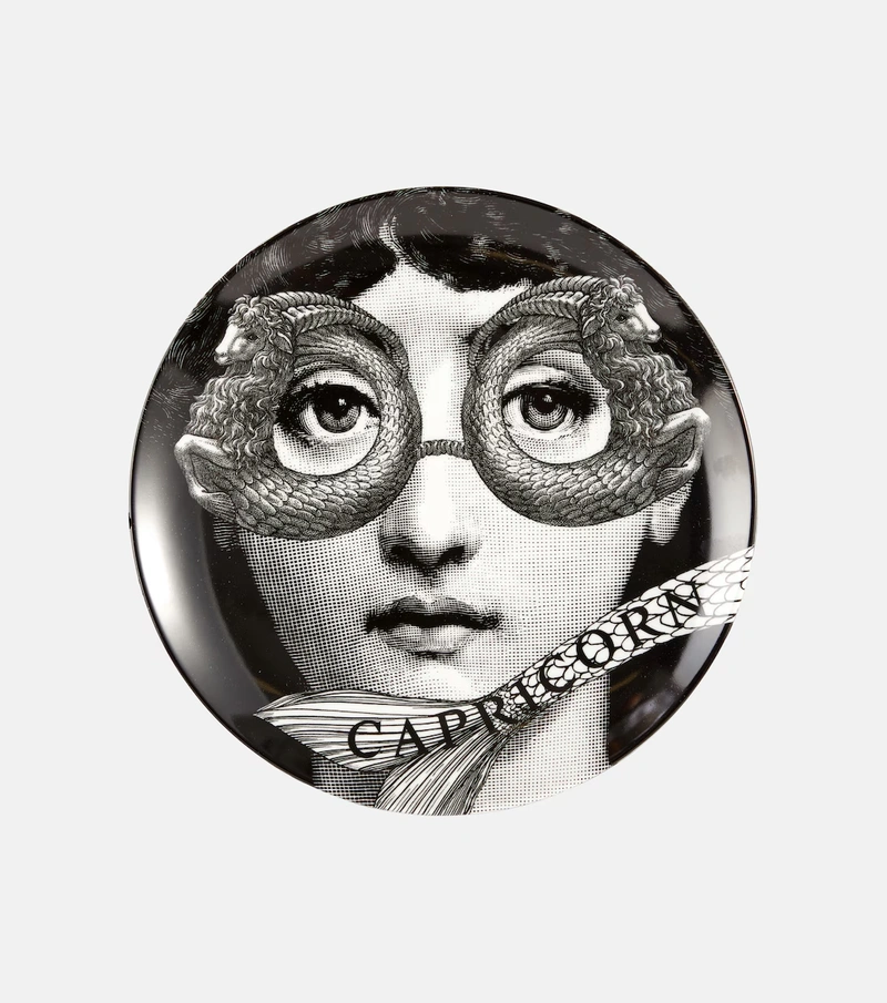 fornasetti capricorn plate capricorn rising style, surreal refined design with timeless artistic and structured aesthetic