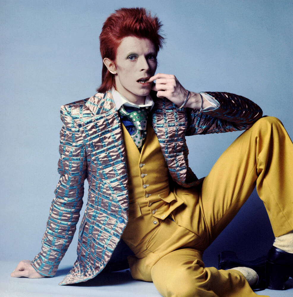 aquarius rising image of David Bowie, iconic unconventional presence with visionary style and transformative artistic identity