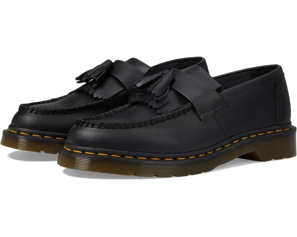 moon edit, low black vegan leather Dr. Martens shoes symbolizing grounding, protection, and quiet strength within lunar energy