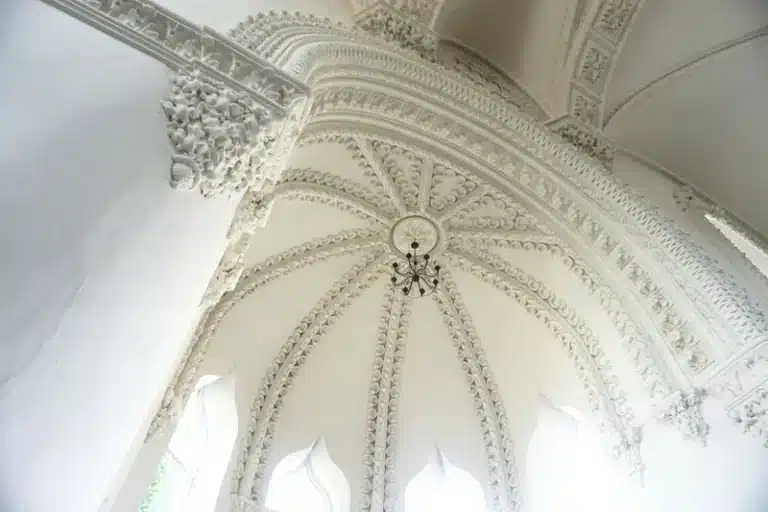 libra rising classical white ceiling with arches, refined symmetry and architectural balance expressing elegance and timeless harmony