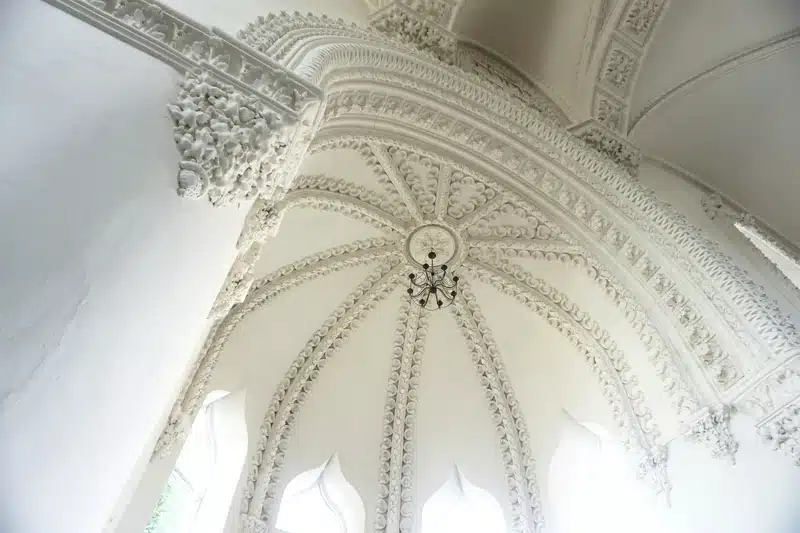 libra rising classical white ceiling with arches, refined symmetry and architectural balance expressing elegance and timeless harmony