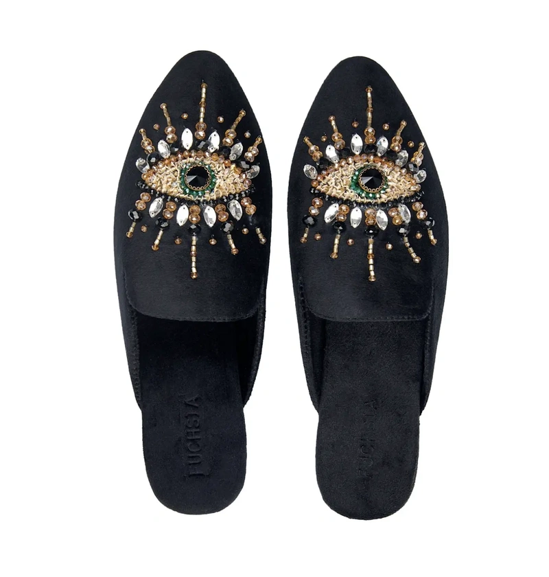 pisces rising black slippers with eye design, mystical and surreal aesthetic with soft dreamlike symbolism