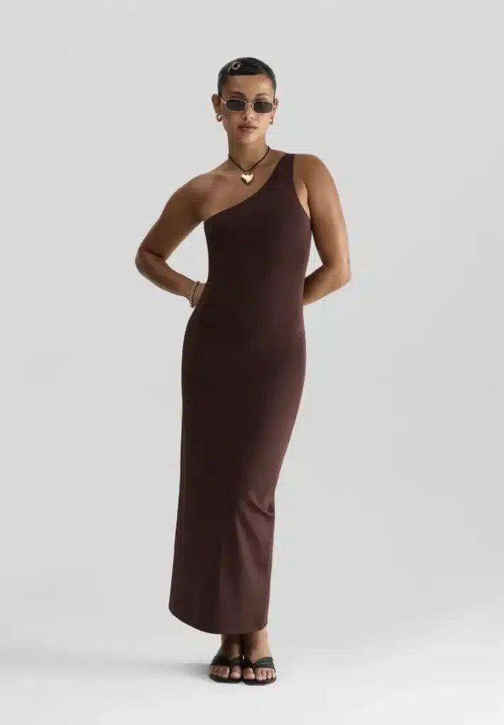 sagittarius rising fitted long brown stretch dress, comfortable flowing silhouette with effortless and adventurous style