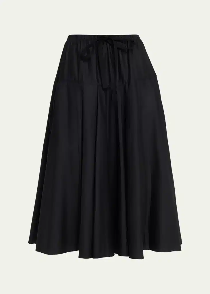 leo season edit, black Italian-style skirt symbolizing elegance, confidence, sensuality, and the expressive glamour of Leo Season