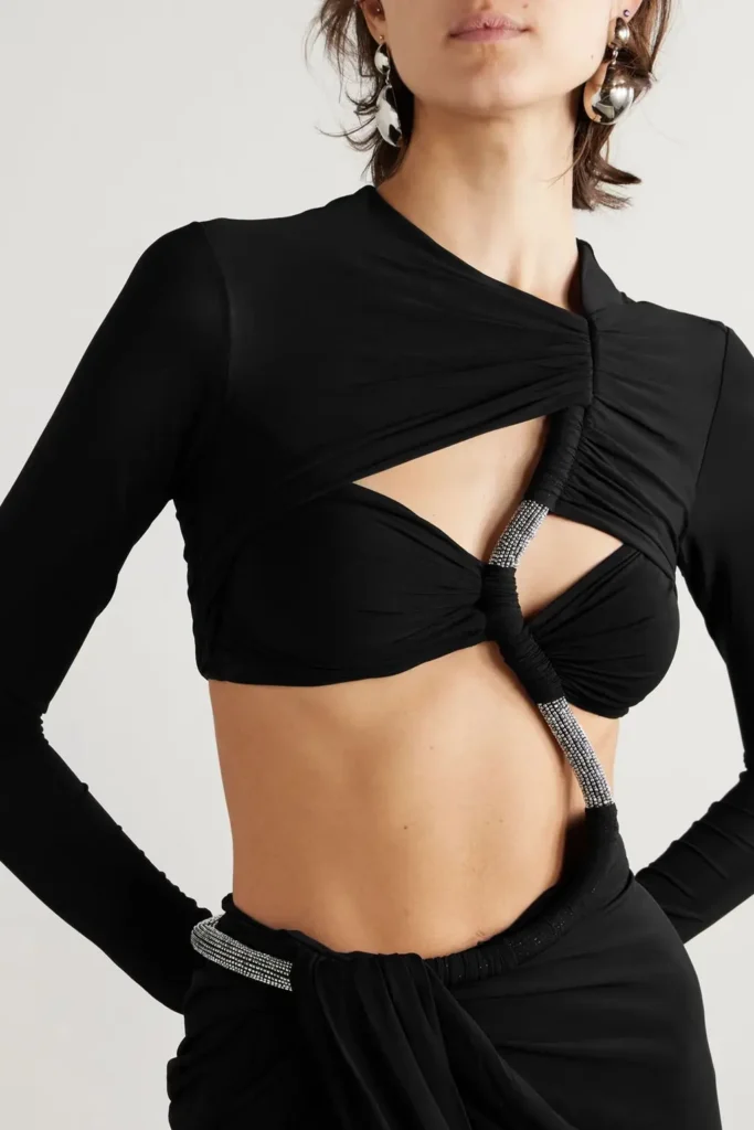 Black dress with cut-out details around the waist and stomach, styled for the Aquarius Full Moon shop the style edit.