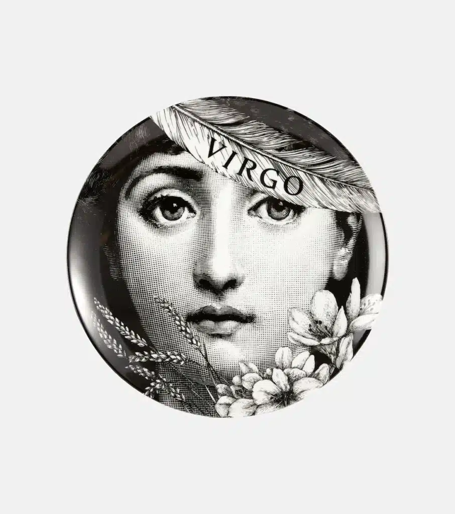 Virgo Season style featuring a Fornasetti plate decorated with a Virgo-inspired face and an elegant monochrome design.