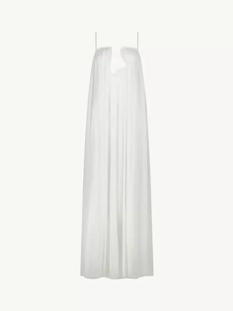 Virgo Season style featuring a long white dress with a clean, elegant silhouette and a refined minimalist aesthetic.