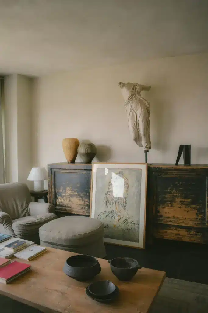 Full Moon in Taurus image with a warm, art filled interior, sculptural decor, natural materials, and earthy tones, evoking comfort, beauty, grounding, and stability.
