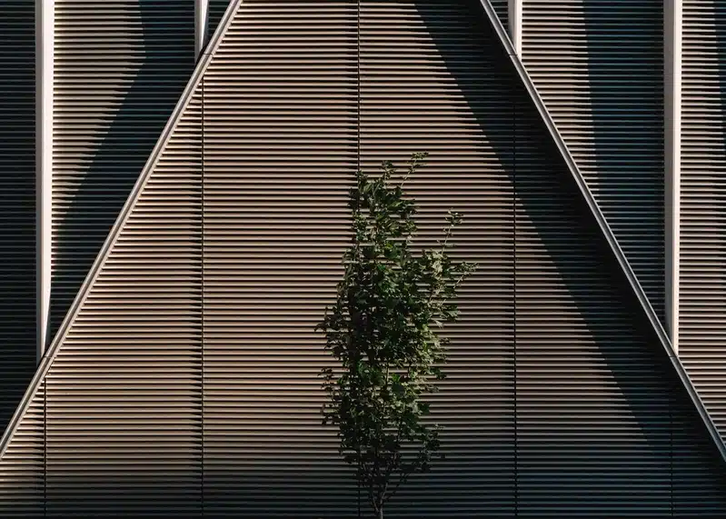 Saturn in Gemini birth chart symbolism shown through geometric architecture, strong shadows, and a solitary tree.