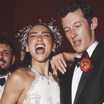 Dua Lipa birth chart image showing Dua Lipa celebrating with her husband during a joyful moment, surrounded by an elegant and festive atmosphere.