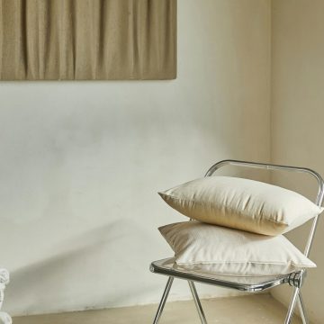 Cancer Full Moon symbolism with a quiet domestic interior, soft pillows, and a sense of emotional safety