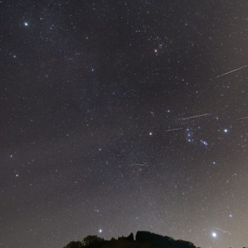 Night sky with stars and visible planet Jupiter.
