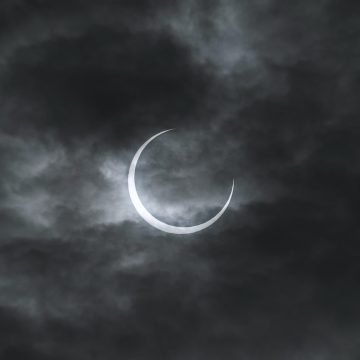 Crescent Moon symbolizing the Moon in the 2nd house.