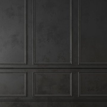 Dark wall with balanced shapes representing Saturn in Libra.