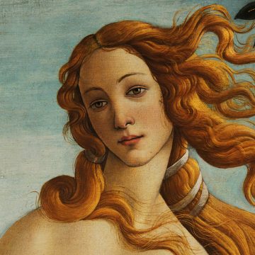 Botticelli’s Venus: close-up of the goddess with flowing golden hair.