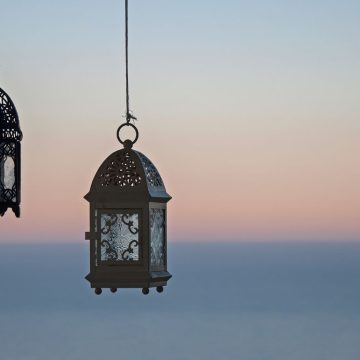 Two lanterns to represent The Hermit, the Virgo tarot card.